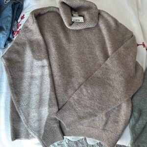 Two H&M size XS warm turtleneck sweaters.